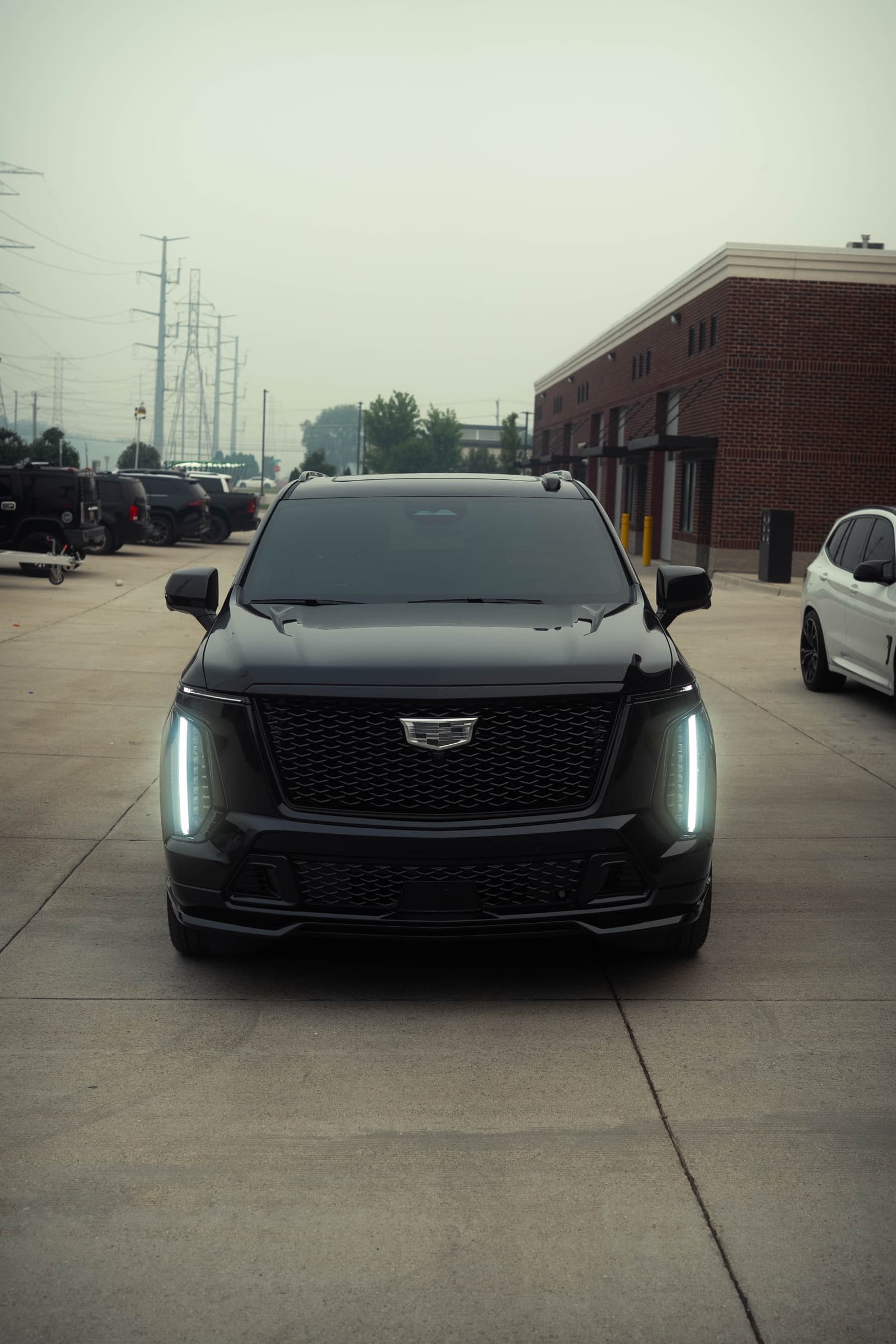 Blacked-out Cadillac Escalade-V outside the Diamond Detailz shop in Shelby Township
